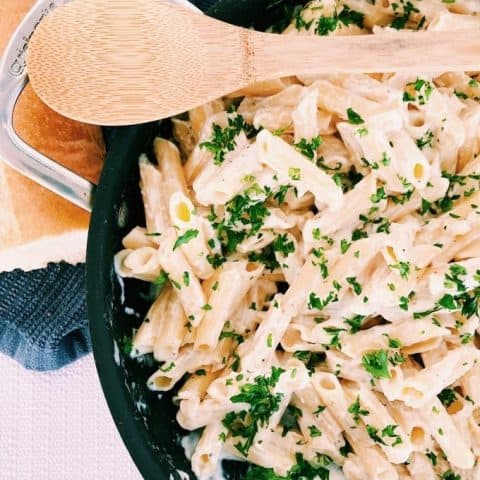 Large pan of pasta with alfredo sauce, an easy recipe for RV cooking.