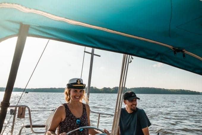 Todd and Julie onboard a sailboat during east coast travel trip.