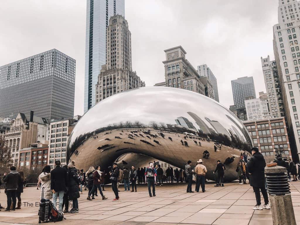 Crowd of people viewing large sculpture outdoor in Chicago