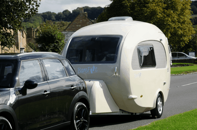 Barefoot trailer in-tow behind a Mini Cooper vehicle