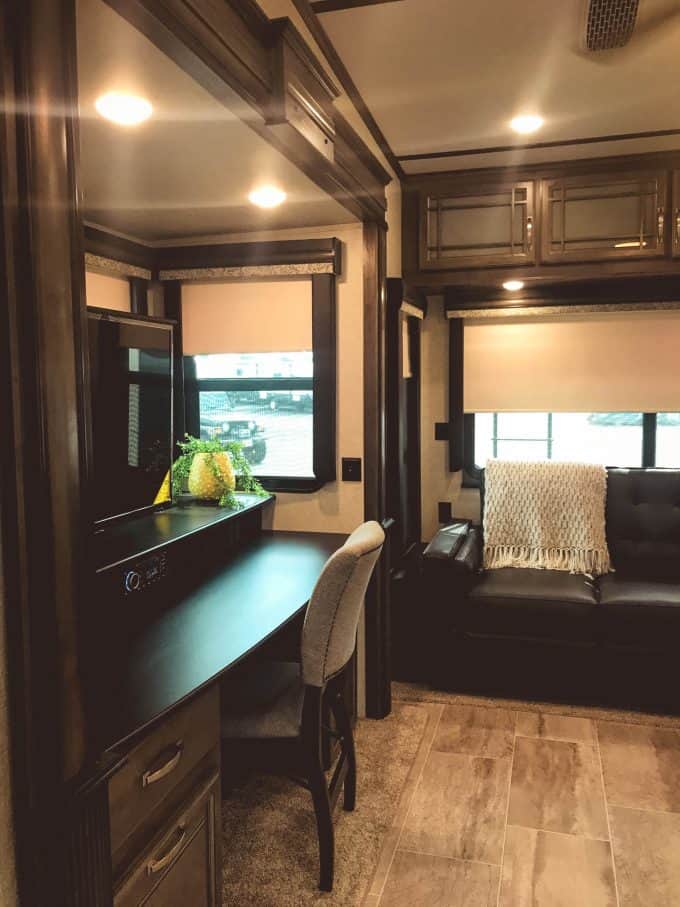 Sofa and desk inside of RV