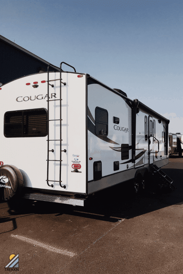 Exterior view of white Keystone Cougar 30RKD Travel Trailer RV