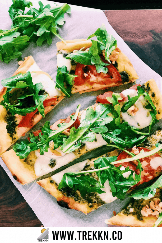 Naan pizza recipe with pesto and arugula