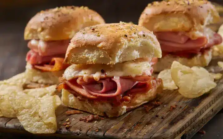 Ham and cheese sliders made using an easy tailgating recipe