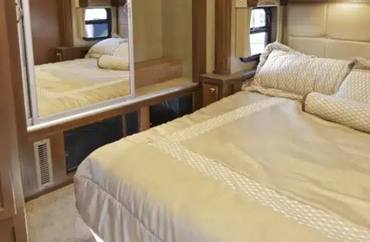 Bed inside RV that needs a bedside storage organizer