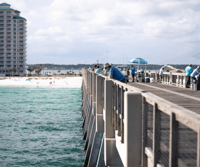 People standing on pier in Santa Rosa County, Florida