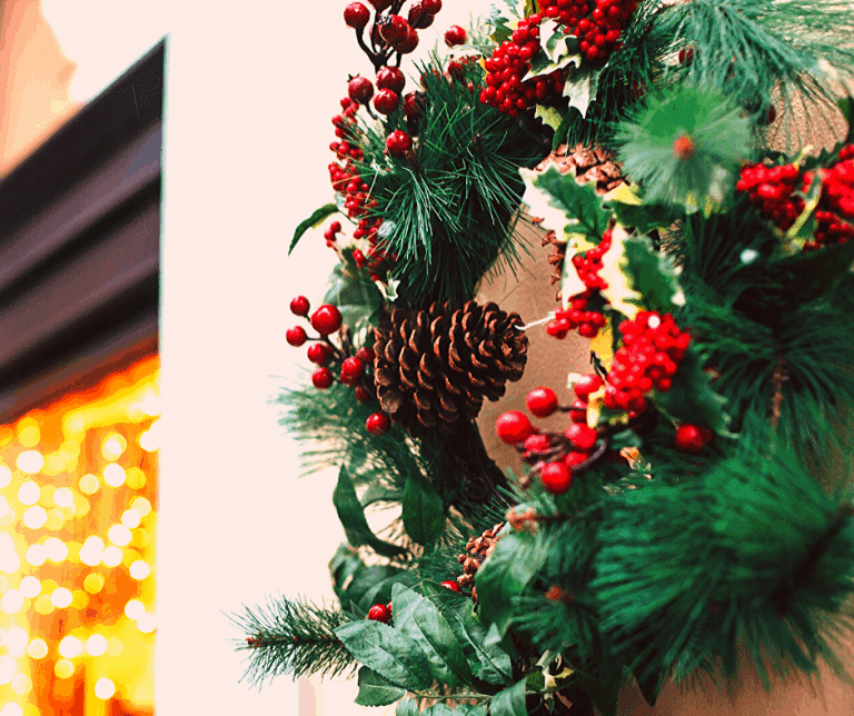 Christmas wreath with pine cone and holly decoration for RV