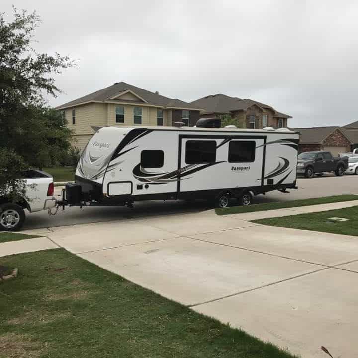 Truck hitched to large travel trailer for RV life