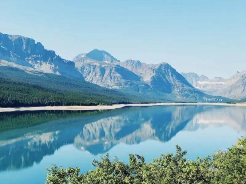 Mountain peaks and lake in Glacier National Park.