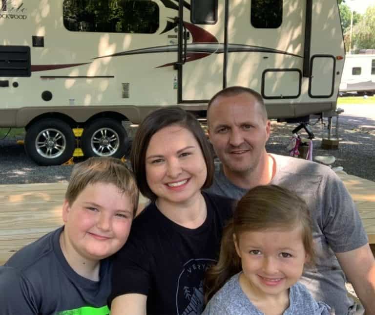 Family in front of RV