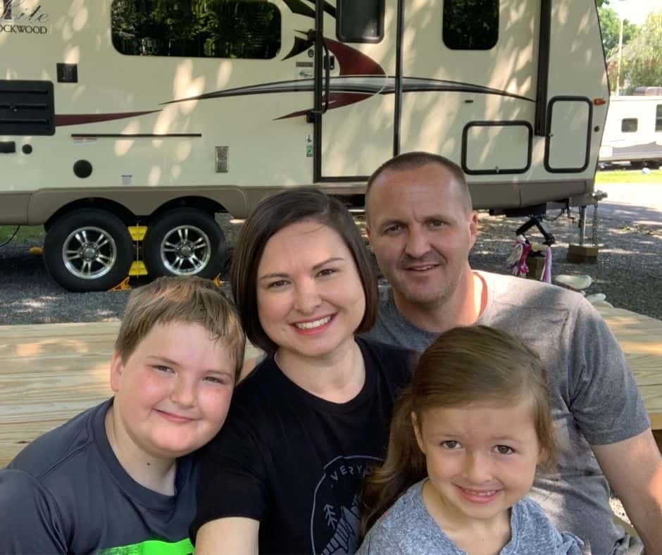 Family in front of RV