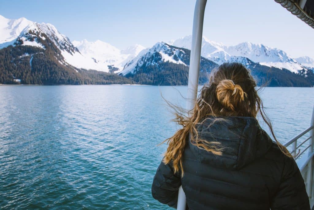 tourists enjoying a boat tour in seward alaska