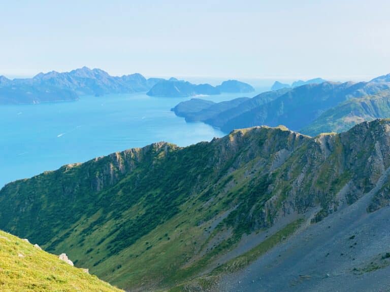 Grassy mountain ridge above sea