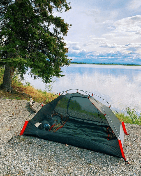 Tent set up near lake