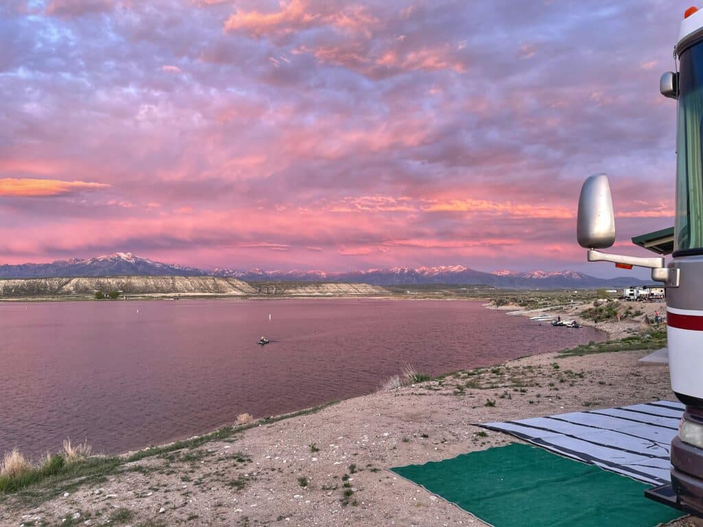 looking over mountains and lake at a top RV boondocking location