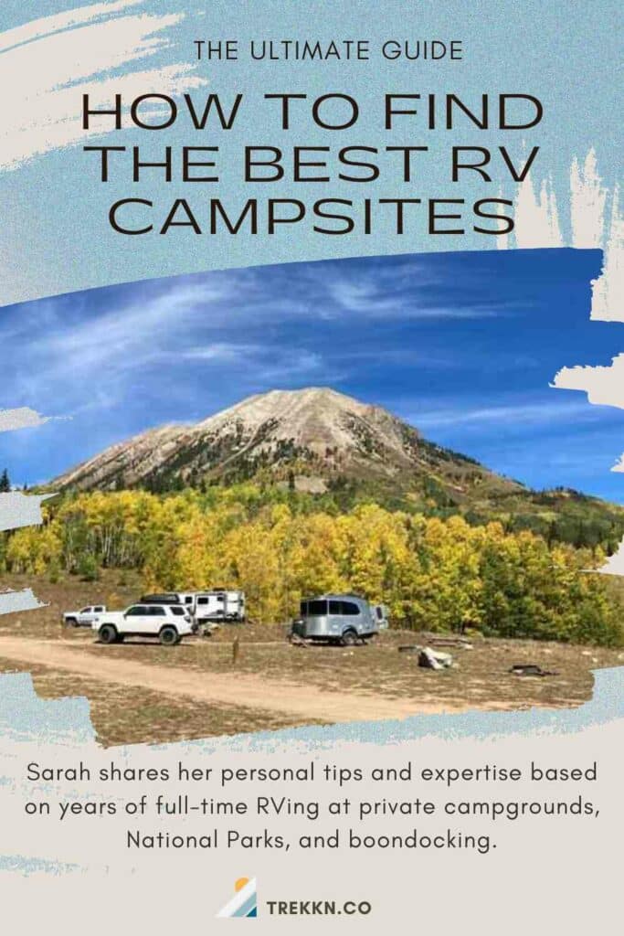 Trucks and travel trailer RVs parked near trees with yellow fall leaves in front of a mountain while boondocking in Colorado.