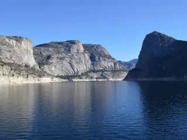 Lake and granite cliffs of Hetch Hetchy Reservoir in Yosemite National Park