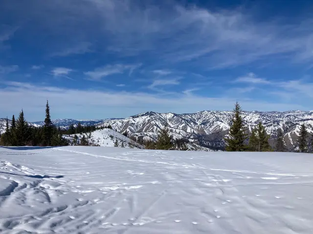 Ski trail and view of mountains in the distance