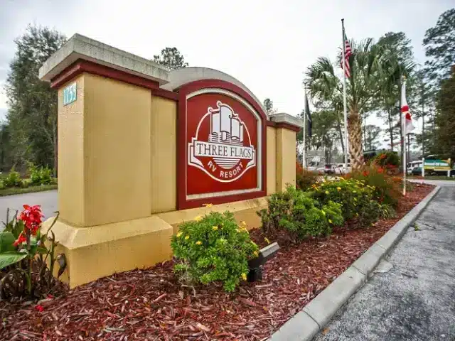 Entrance sign to Thousand Trails Three Flags RV Resort