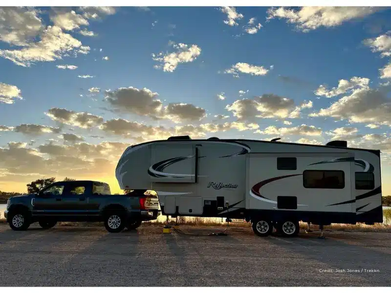 2017 Grand Design Reflection Fifth Wheel and black tow vehicle